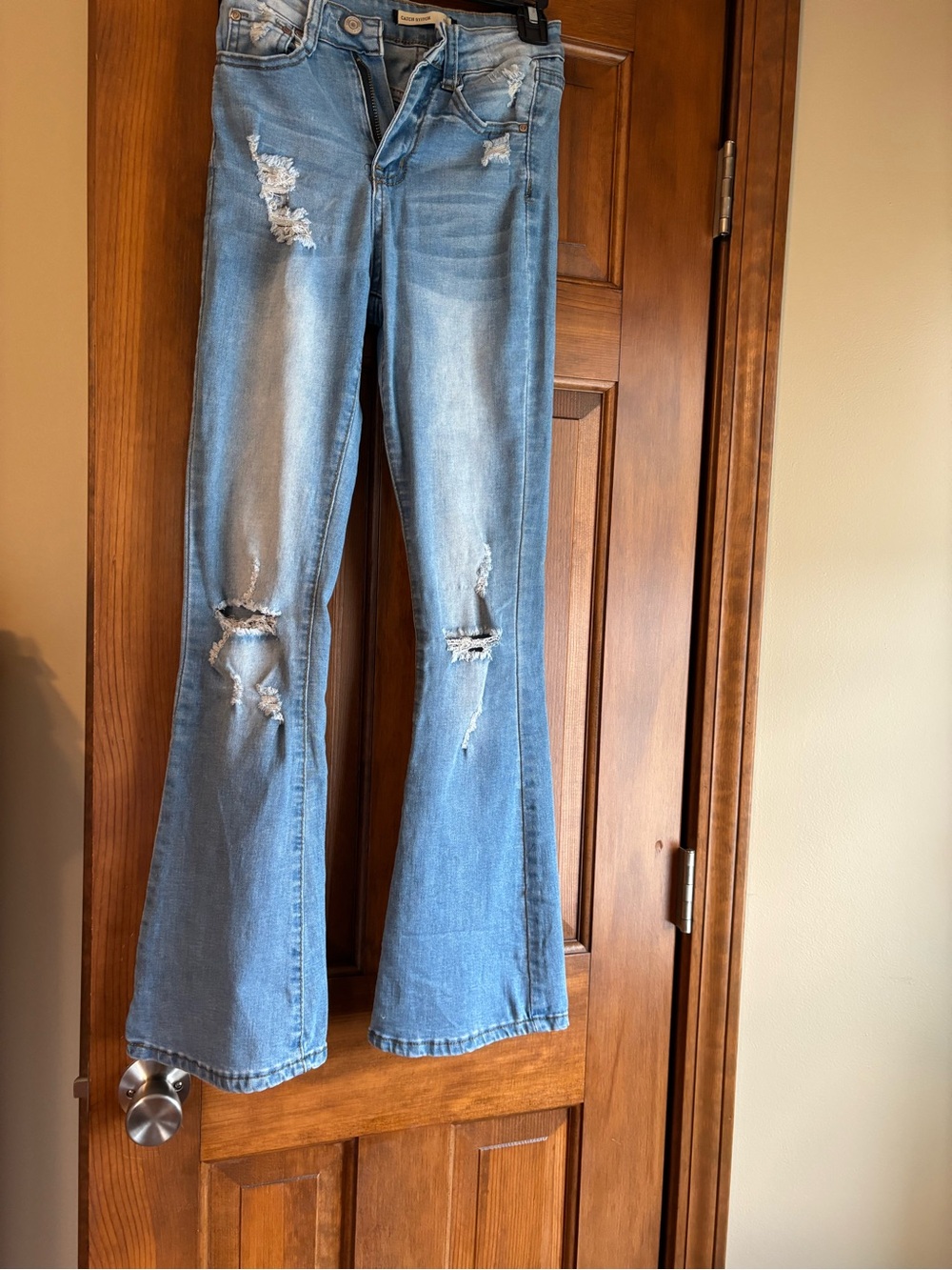 Women’s Light Blue Distressed Flare Jeans